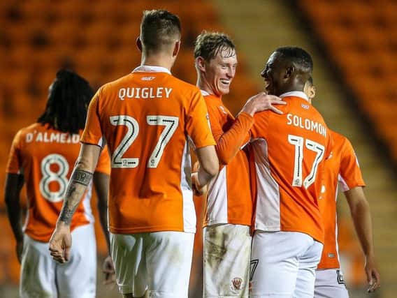 Sean Longstaff celebrates scoring Blackpool's second goal