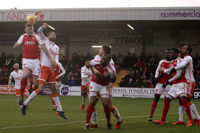 Fleetwood Town's Ashley Eastham directs a headed effort off target