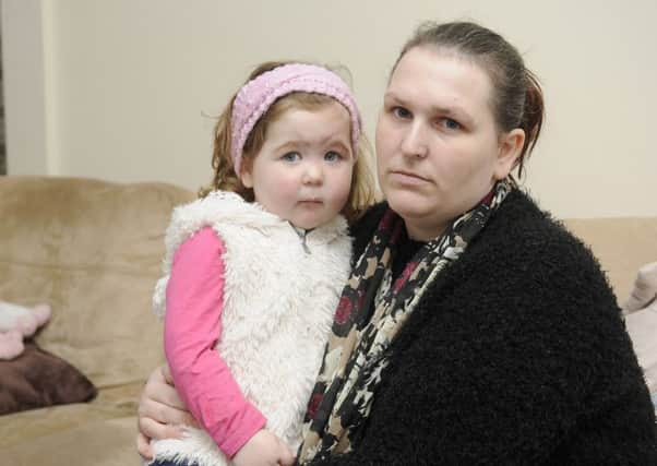 The Booth family have been left homeless after their house in Cleveleys was flooded.  Pictured is Monica Booth with daughter Samantha Booth, aged 2.