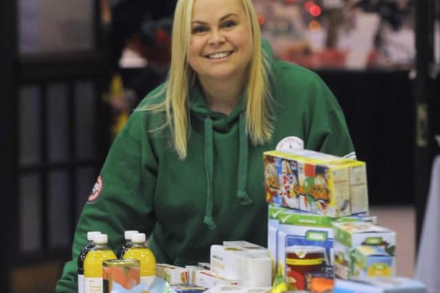 Locals Helping Locals at Christmas collecting food donations for Blackpool Food Bank.  Pictured is Hayley Kay.