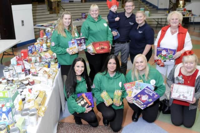 Locals Helping Locals at Christmas collecting food donations for Blackpool Food Bank