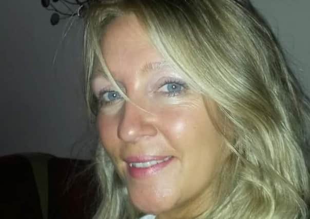 The body of Lisa Chadderton, 44, was found at a flat above Gillepsies pub on Topping Street,Blackpool