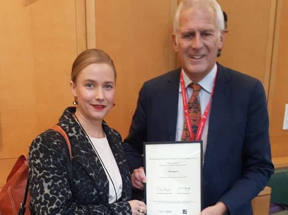 Danielle Yates from Montagues restaurant wiith Gordon Marsden in Parliament to receive her Responsible Business Award