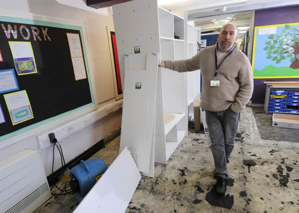 Staff at Anchorsholme Academy are helping to get the school back up and running following the flash floods.  Pictured is headteacher Graeme Dow