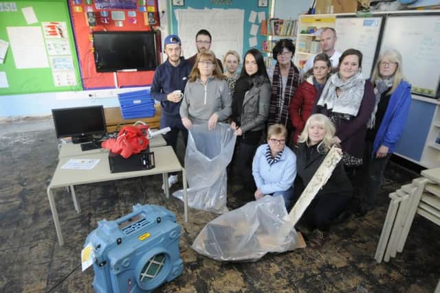 Staff at Anchorsholme Academy are helping to get the school back up and running follwoing the flash floods last week