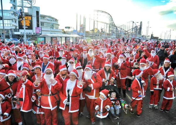 Picture by Julian Brown 03/12/17

The warm up begins

Santa Dash from the Sandcastle to Central Pier, Blackpool, and back in aid of Brian House Children's Hospice