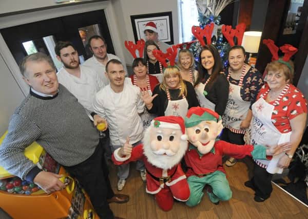 Staff at the Newton Arms host a free Christmas meal