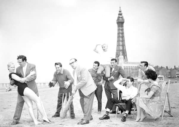 Stars of the Central Pier Show,' Let's Have Fun' enjoying a break in rehearsals with a game of cricket on the sands. From left to right: Babette, Eric Morecambe, Ernie Wise, Jimmy James, The Trio Vedette, David Galbraith, Bretton Woods and Shelley Marshall.  Published in The Gazette in May 1959