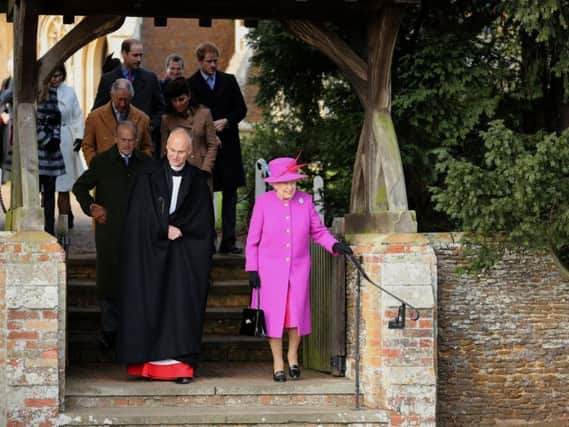 Queen Elizabeth II as she leaves St Mary Magdalene Church on the Sandringham estate in Norfolk following the traditional Christmas Day service with other members of the Royal Family