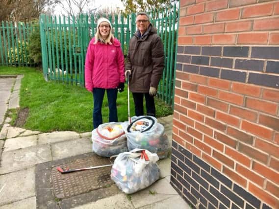 Rev Peter Lillicrap is joined by Rev Hannah Boyd on a recent litter picking initiative at Grange Park