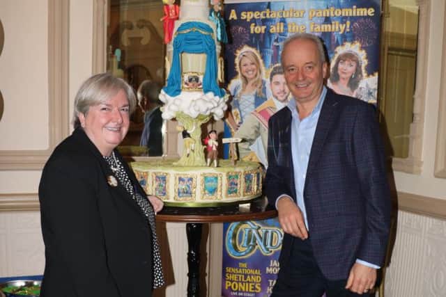 Grand Theatre chief executive Ruth Eastwood and UK Productions Martin Dodd celebrate 21 years of pantos