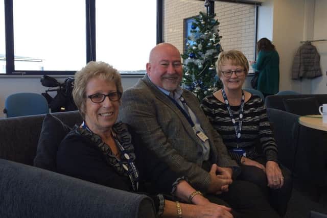 Ian Williamson-Owen, Wilma Cunliffe and Jean Carter, volunteers at The Silver Line in Blackpool