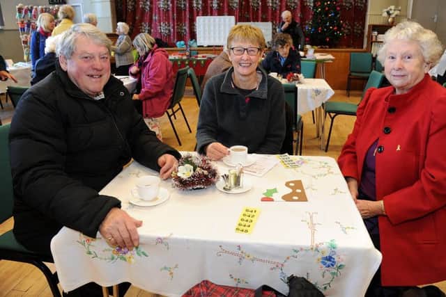 Melvyn Slater, Ann Hearne and Marjorie Heyworth, at the Action For Children coffee morning