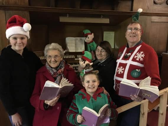 The choir from Sacred Heart is appealing for people to brave the road works and come to the manger for their carol service