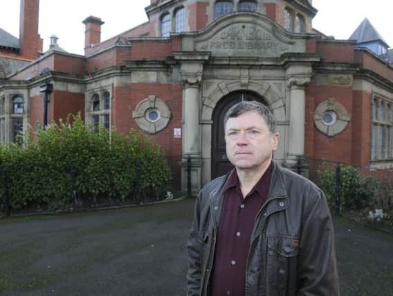 Coun Peter Buckley outside St Annes Library