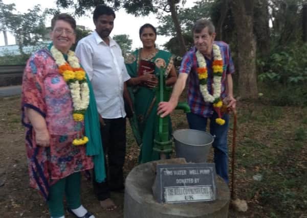 Carol and Len Fowler with friends in India