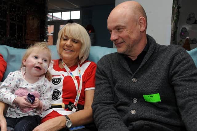 Players and staff from Fleetwood Town FC paid a festive visit to Brian House children's hospice in Bispham.
Fleetwood manager Uwe Rosler meets Lana Driver.  PIC BY ROB LOCK
20-12-2017