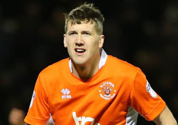 Blackpool midfielder Jim McAlister is nearing a return to action