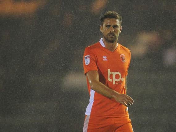 Clark Robertson rescued a point for Blackpool