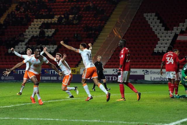 Robertson's 90th minute goal earned Blackpool a well-earned draw