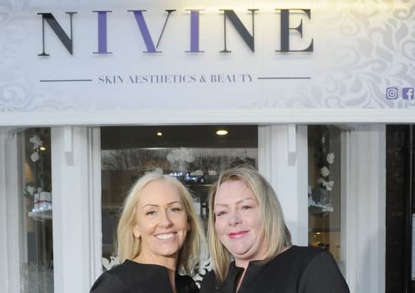 The opening of Nivine Salon on Whitegate Drive.  Pictured is Joy Spencer with Anna White.