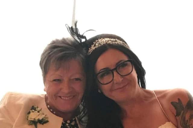 Kelly and her mum on her wedding day.