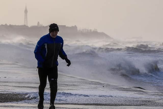 A man jogging along the prom this morning (Picture: Peter Byrne/PA Wire)