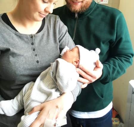 Hannah Twist and Simon Ramsden, with baby Rafa