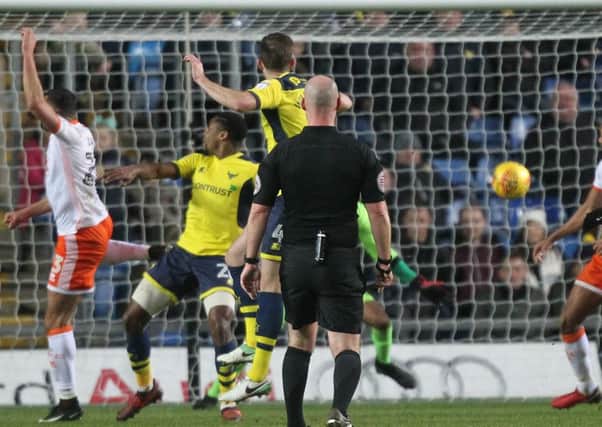 Oxford United score their late goal against Blackpool on Saturday