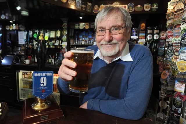 The FA Cup comes to the Strawberry Gardens pub.  Pictured is landlord Dave Shaw with the Jamie Vardy beer.