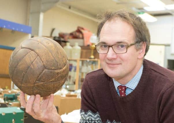 Auctioneer Charles Hanson with the famous ball