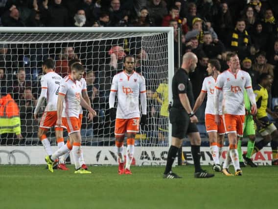 The Blackpool players react to Oxford's late winner
