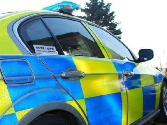 A police officer was taken to hospital following a collision with another police car