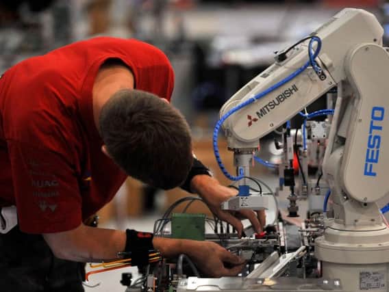 Manufacturing is doing well but wary of increasing costs