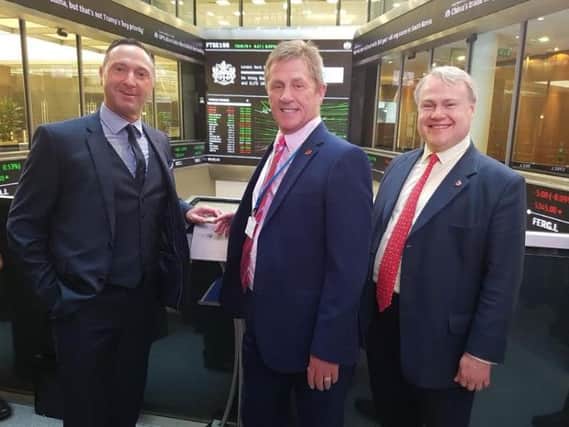 Sean Egan and Bill Dugdale of DES with, right, Dr Robert Barnes (Head of Primary and Secondary Markets at the London Stock Exchange