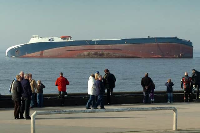 Crowds on the promenade at Cleveleys flock to see the stricken cargo ferry Riverdance