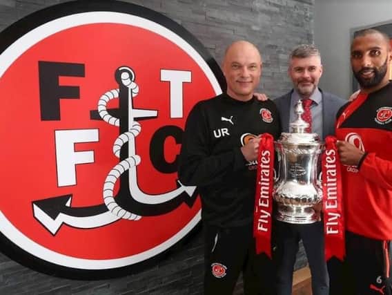 Fleetwood head coach Uwe Rosler, CEO Steve Curwood and skipper Nathan Pond with the FA Cup