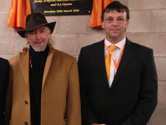 Owen Oyston, left, and his son Karl