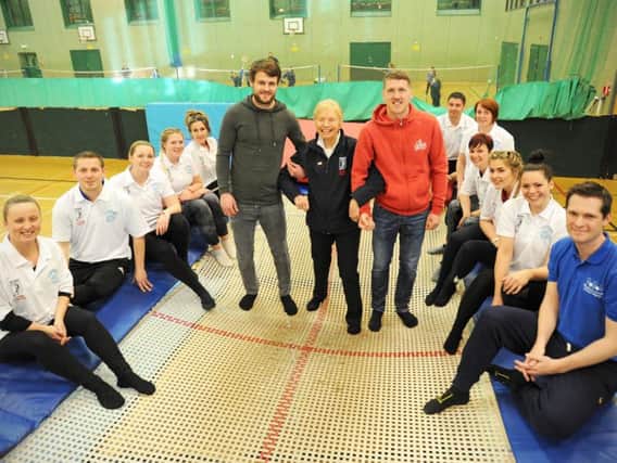 Blackpool players Andy Taylor and Jim McAlister pictured with Stanley Matthews' daughter Jean Gough MBE and teachers on the two-day course.
