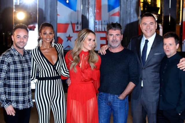 The Britain's Got Talent team, Ant McPartlin, Alesha Dixon, Amanda Holden, Simon Cowell, David Walliams and Declan Donnelly during a photo call at the Winter Gardens