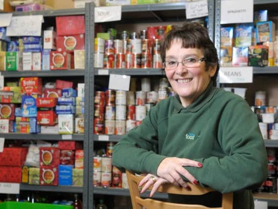 Volunteers hard at work at Fylde Food Bank in St Annes.  Pictured is Christine Miller
