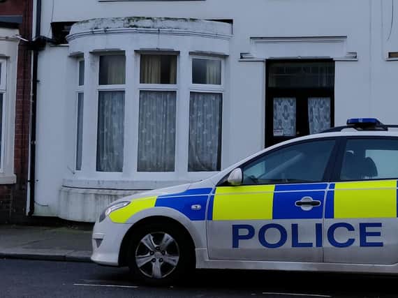 Police outside a house in Clinton Avenue, Blackpool, this afternoon