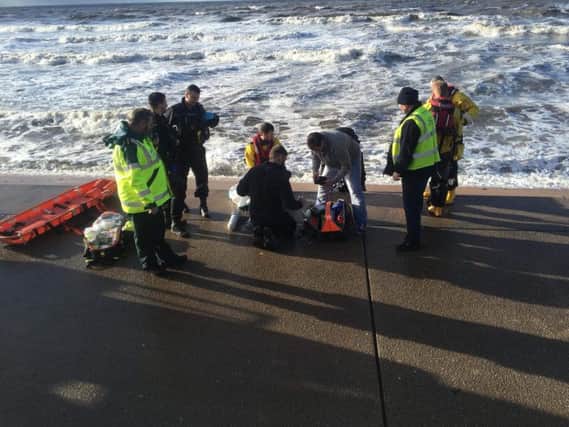 The casualty was helped from the sea and given treatment by RNLI volunteers until paramedics arrived (Picture: Blackpool RNLI)