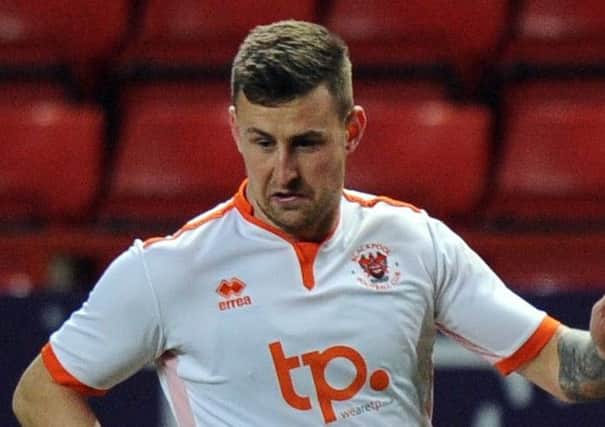 Blackpool striker Scott Quigley has headed out on loan