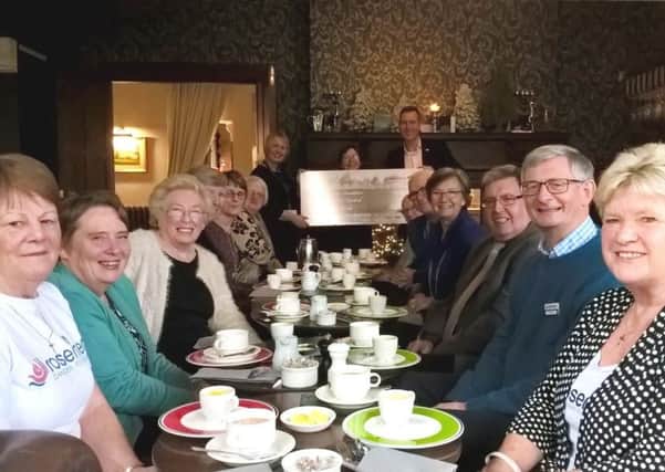 Volunteers from Rosemere Cancer Foundation enjoying afternoon tea at Bartle Hall