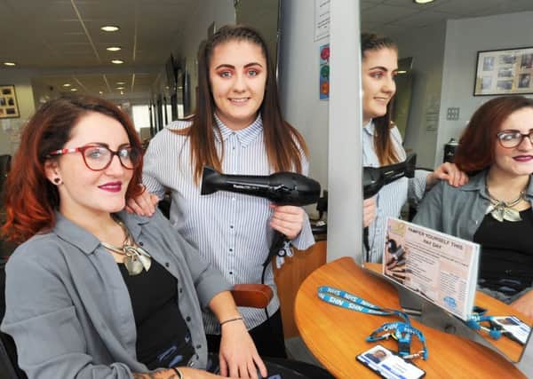 VLLancs are offering NHS staff hair treatments for a donation to Blue Skies Hospital Fund.  Pictured is trainee hairdresser Destiny Nixon with Lauren Codling from Blue Skies.