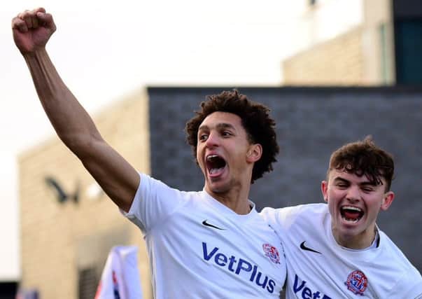 Fylde's Lewis Montrose celebrates scoring against Macclesfield Town with team-mate Jonny Smith    Picture: Steve McLellan