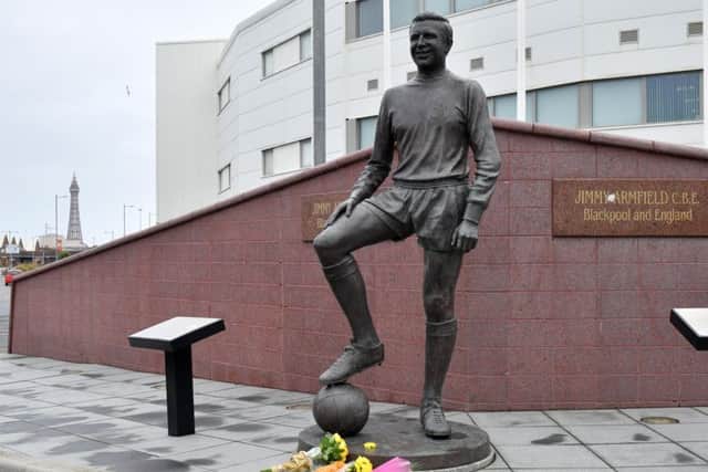Flowers at the statue of Jimmy Armfield at Bloomfield Road following his death, aged 82