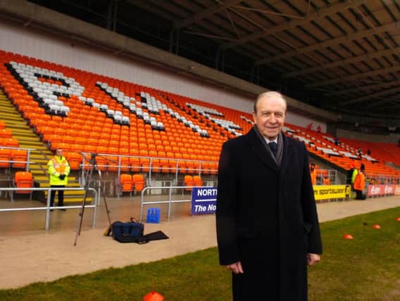 Armfield pictured in front of the stand named in his honour