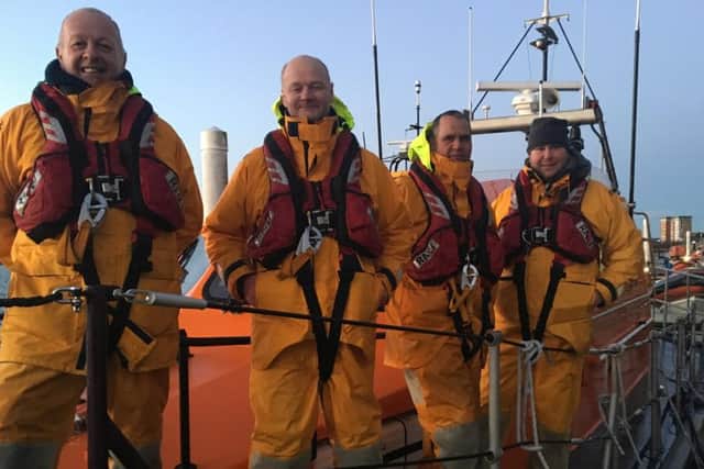 RNLI crewmen (from left): Gary Bird, Nick Glassbrook, John Atkinson, Tom Stuart